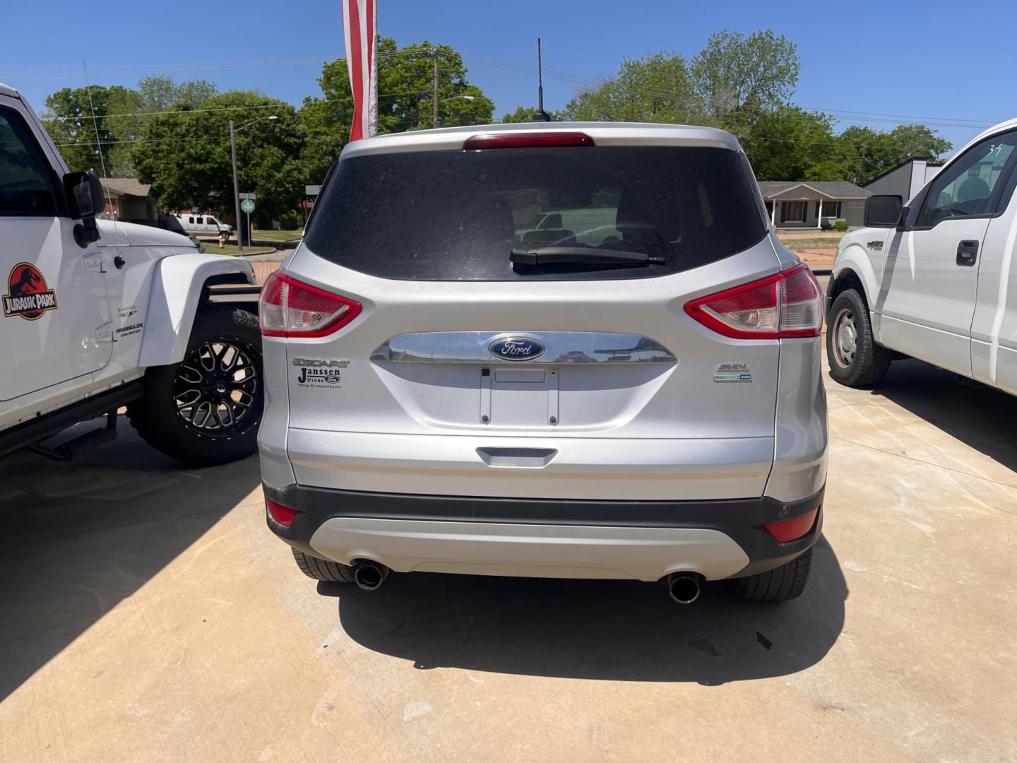 2013 BLACK FORD ESCAPE SEL SEL 4WD (1FMCU9H98DU) with an 2.0L L4 DOHC 16V engine, 6-Speed Automatic transmission, located at 8101 E. Skelly Dr., Tulsa, OK, 74129, (918) 592-3593, 36.121891, -95.888802 - Photo#2